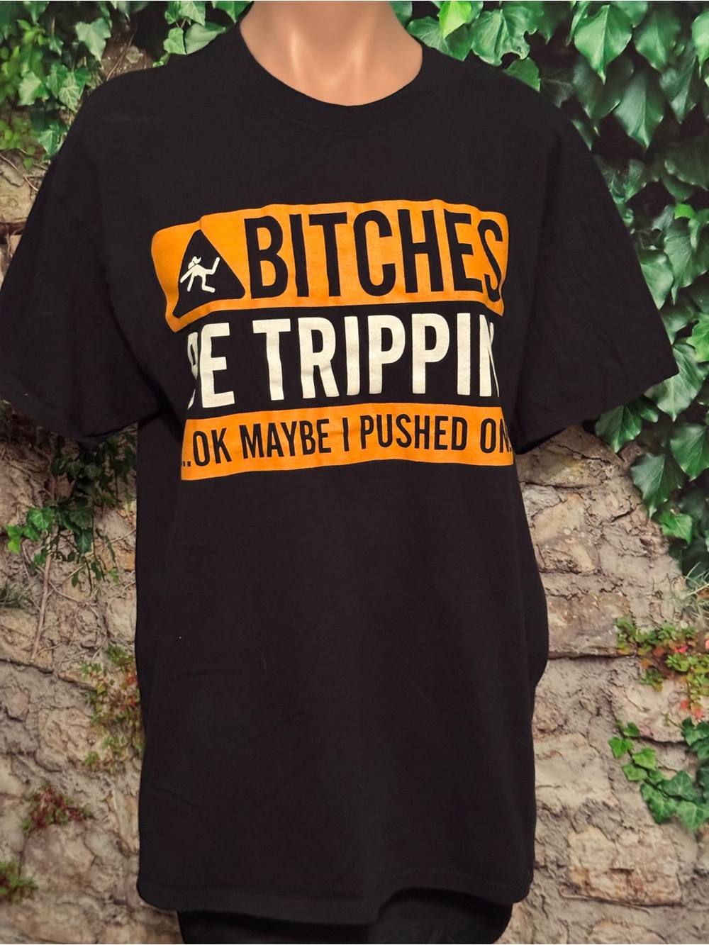 “Bitches be trippin”- Black & Orange Short Sleeve Graphic Tee